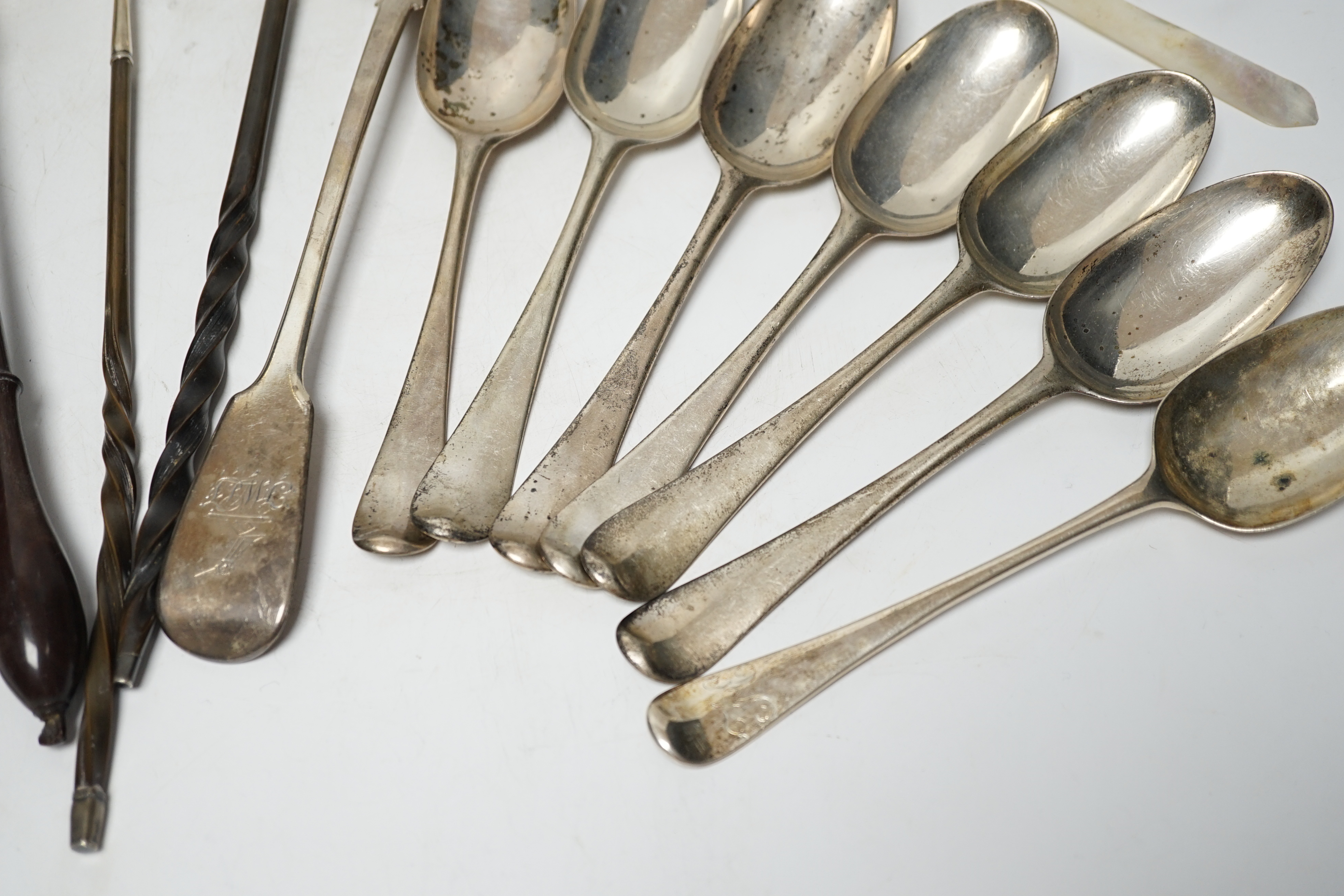 A late William IV silver fiddle pattern basting spoon, London, 1836, seven assorted 19th century silver base mark spoons, a Georgian Scottish dessert spoon, two toddy ladles, A George II brandy ladle, London, 1735, a Geo